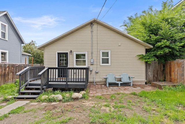 2212 W Gardner Ave, Spokane, WA 99201 - rear view of property with fence and a wooden deck