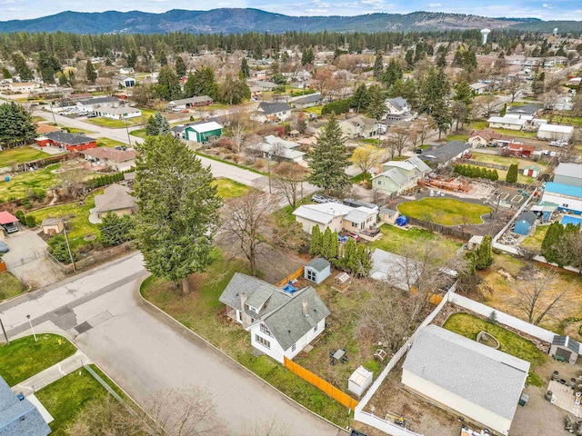 13513 E 12th Ave, Spokane Valley, WA 99216 - aerial view of property and surrounding area with nearby suburban area and mountains