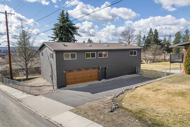 2311 W Wedgewood Ave, Spokane, WA 99208 - view of front facade featuring asphalt driveway and an attached garage