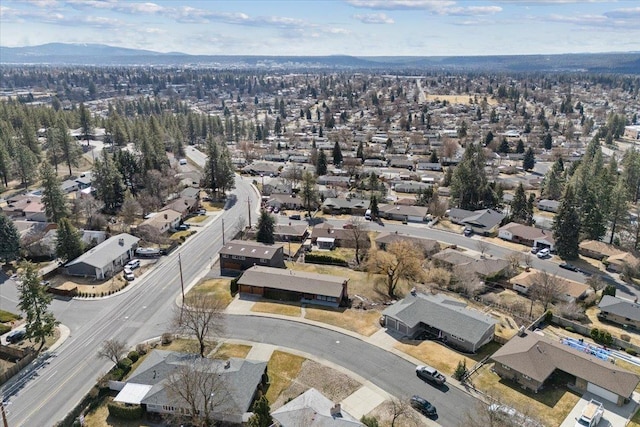 2311 W Wedgewood Ave, Spokane, WA 99208 - aerial view of property's location featuring nearby suburban area and a mountainous background