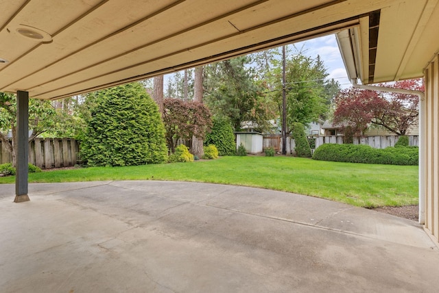 1610 E 35th Ave, Spokane, WA 99203 - view of patio / terrace featuring an outbuilding and a storage unit