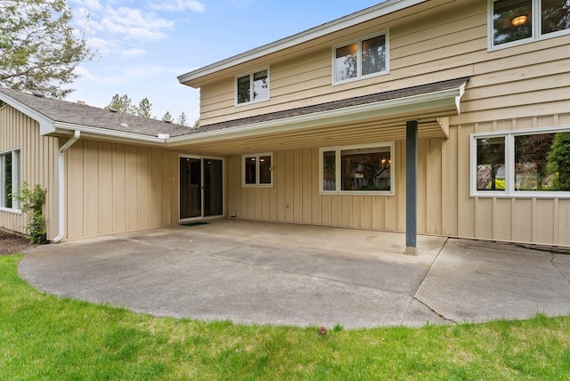 1610 E 35th Ave, Spokane, WA 99203 - back of house featuring a patio area and roof with shingles