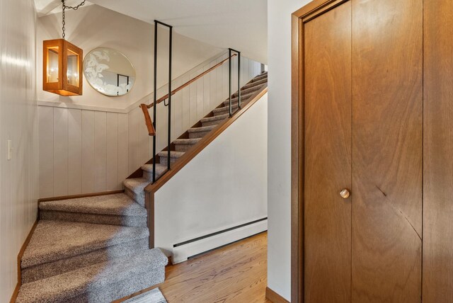 1610 E 35th Ave, Spokane, WA 99203 - stairs with baseboard heating and wood finished floors