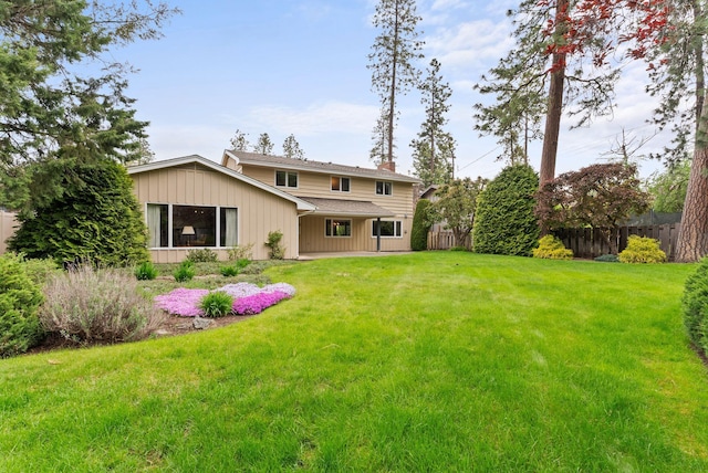 1610 E 35th Ave, Spokane, WA 99203 - back of property featuring a chimney and board and batten siding