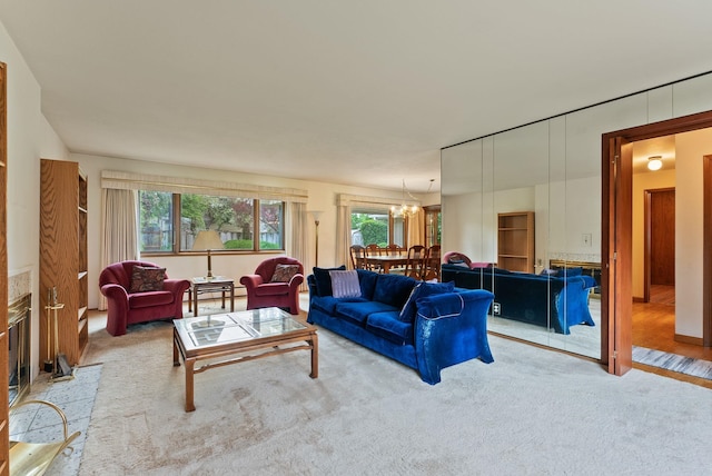 1610 E 35th Ave, Spokane, WA 99203 - living room featuring healthy amount of natural light, a chandelier, and carpet floors