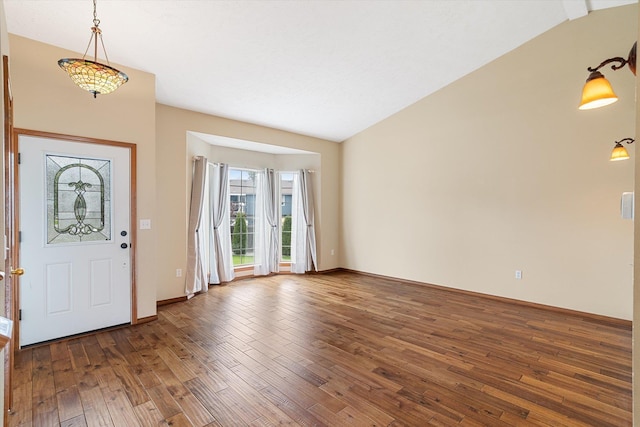 7421 W Lanzce Ct, Nine Mile Falls, WA 99026 - entryway featuring hardwood / wood-style flooring, baseboards, and vaulted ceiling