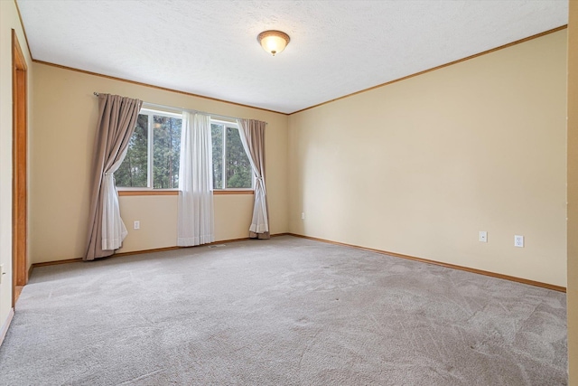 7421 W Lanzce Ct, Nine Mile Falls, WA 99026 - spare room with crown molding, light colored carpet, baseboards, and a textured ceiling