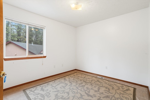 7421 W Lanzce Ct, Nine Mile Falls, WA 99026 - empty room with baseboards