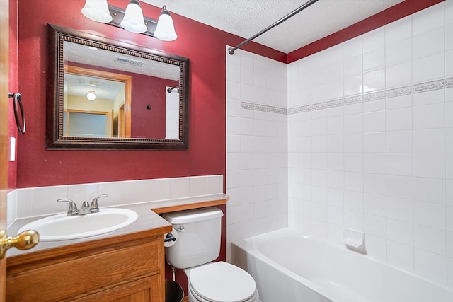 7421 W Lanzce Ct, Nine Mile Falls, WA 99026 - full bath with toilet, a textured ceiling, shower / bathtub combination, and vanity