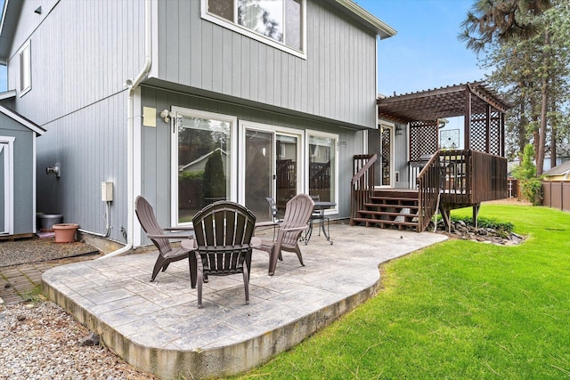 7421 W Lanzce Ct, Nine Mile Falls, WA 99026 - back of house with a pergola, a lawn, a deck, and a patio area