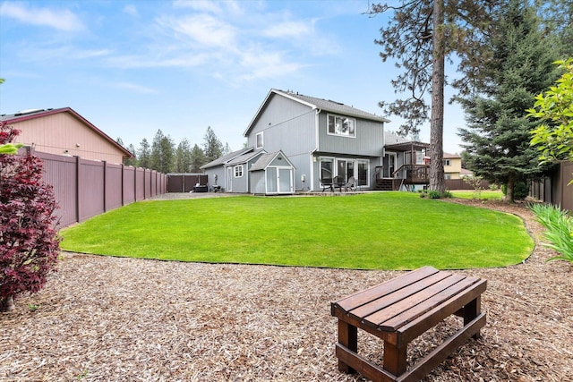 7421 W Lanzce Ct, Nine Mile Falls, WA 99026 - rear view of property with a patio area and a wooden deck