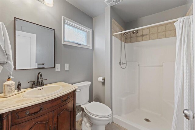 1421 N Sunderland Rd, Spokane Valley, WA 99206 - full bathroom with vanity, a shower with curtain, and toilet