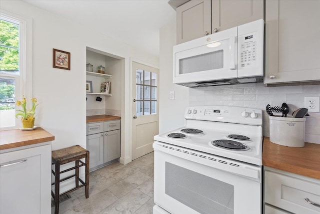 1421 N Sunderland Rd, Spokane Valley, WA 99206 - kitchen featuring white appliances, wooden counters, gray cabinetry, backsplash, and open shelves