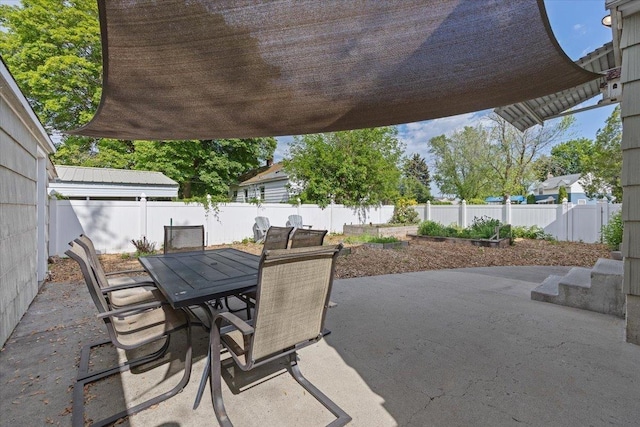 1421 N Sunderland Rd, Spokane Valley, WA 99206 - fenced backyard featuring a patio area and outdoor dining space