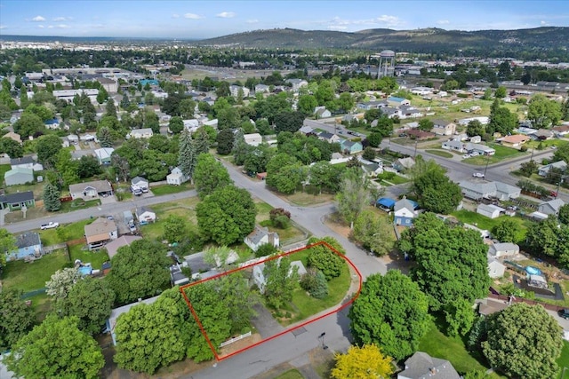 1421 N Sunderland Rd, Spokane Valley, WA 99206 - view of property location with property boundaries highlighted, mountains, and nearby suburban area