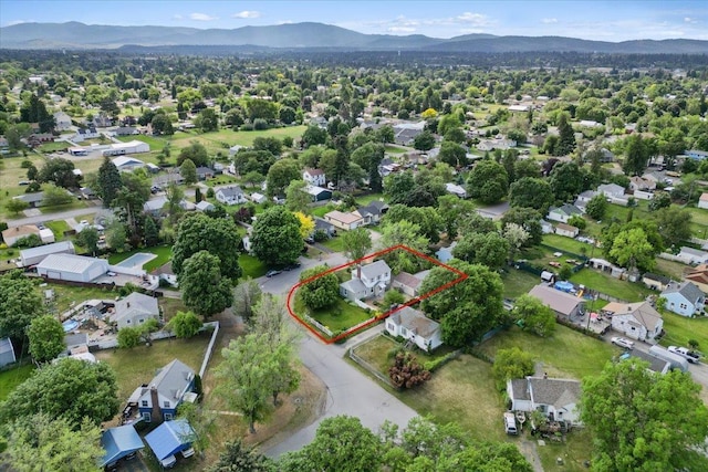 1421 N Sunderland Rd, Spokane Valley, WA 99206 - aerial perspective of suburban area featuring property parcel outlined and mountains