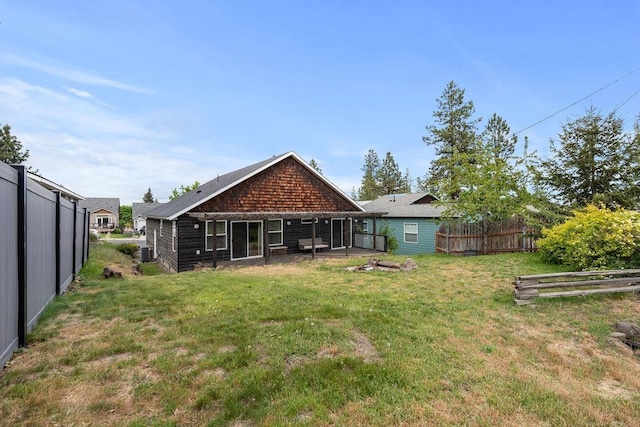 rear view of house with central air condition unit