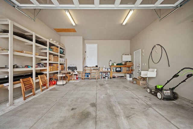 garage with a workshop area