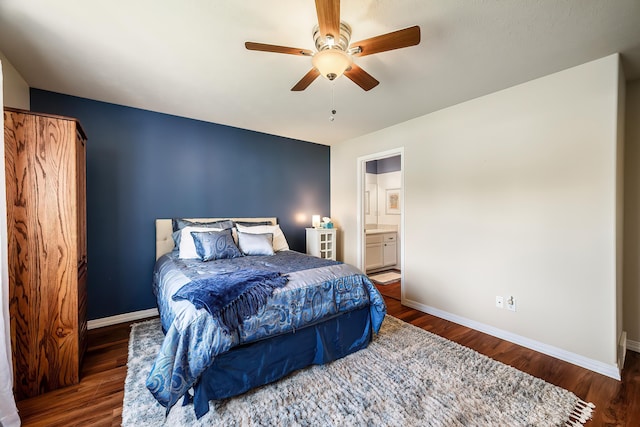 bedroom with baseboards and wood finished floors