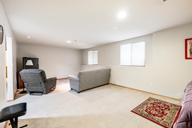 living room with carpet, baseboards, and recessed lighting
