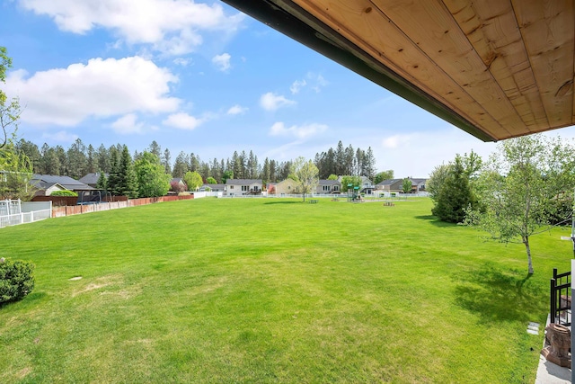 view of yard featuring a residential view
