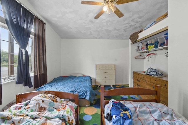 14203 E Belmont Rd, Mica, WA 99023 - bedroom with ceiling fan