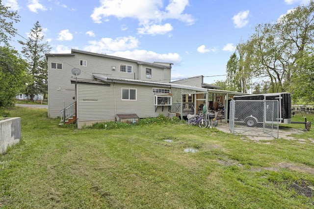 14203 E Belmont Rd, Mica, WA 99023 - rear view of property with a lawn