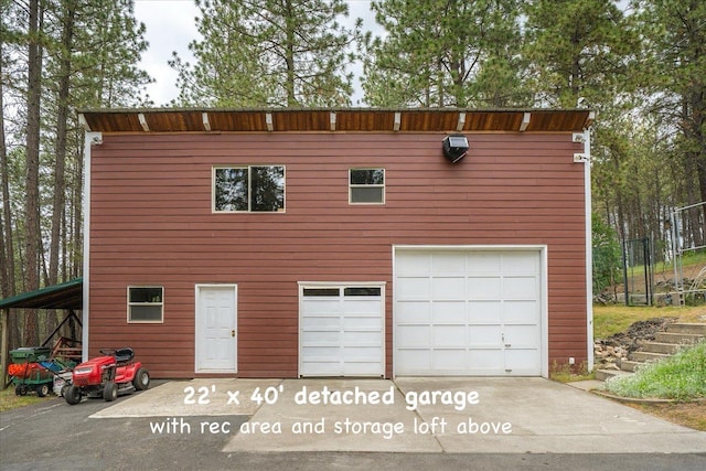 5217 E Stoughton Rd, Valleyford, WA 99036 - view of front of property with concrete driveway and a garage