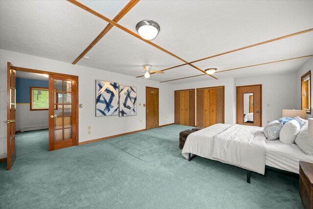 5217 E Stoughton Rd, Valleyford, WA 99036 - bedroom with a baseboard heating unit, carpet floors, french doors, baseboards, and a ceiling fan