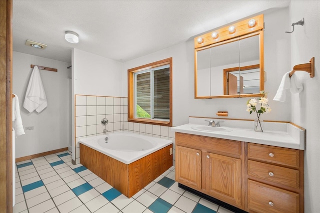 5217 E Stoughton Rd, Valleyford, WA 99036 - full bath featuring vanity, a garden tub, and a textured ceiling