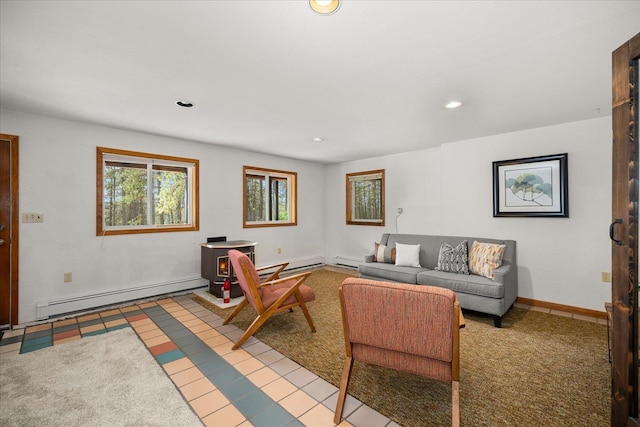 5217 E Stoughton Rd, Valleyford, WA 99036 - living room featuring a baseboard heating unit, recessed lighting, baseboards, baseboard heating, and tile patterned flooring