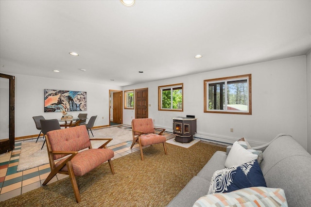 5217 E Stoughton Rd, Valleyford, WA 99036 - living room with a wood stove, recessed lighting, and baseboards