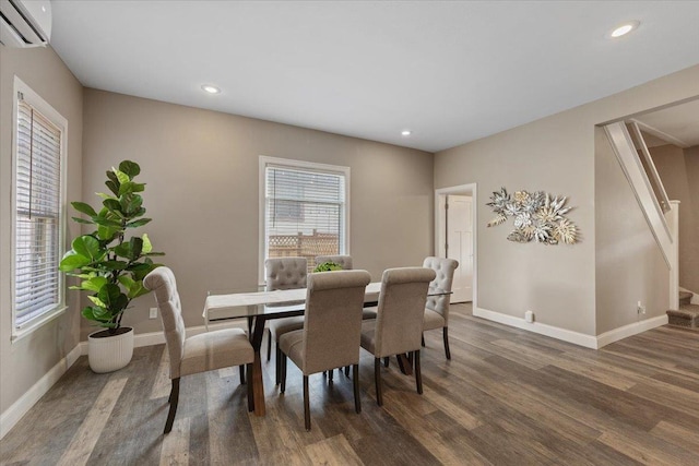 1721 E 12th Ave, Spokane, WA 99202 - dining space featuring a wall mounted air conditioner, wood finished floors, baseboards, stairs, and recessed lighting