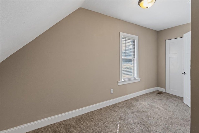 1721 E 12th Ave, Spokane, WA 99202 - bonus room featuring carpet, lofted ceiling, and baseboards
