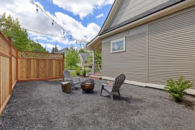 1721 E 12th Ave, Spokane, WA 99202 - view of patio featuring a fire pit and fence