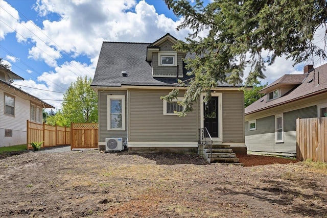 1721 E 12th Ave, Spokane, WA 99202 - back of property featuring entry steps, fence, ac unit, and a shingled roof
