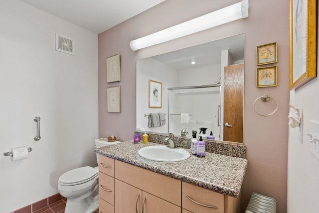 8310 E Belair Rd, Valleyford, WA 99036 - bathroom featuring toilet, vanity, tile patterned floors, and a shower
