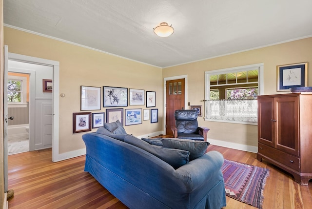 8310 E Belair Rd, Valleyford, WA 99036 - living area featuring light wood-style floors, baseboards, and crown molding