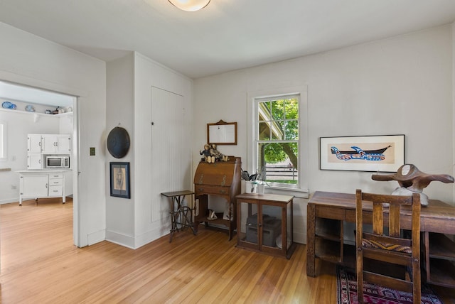 8310 E Belair Rd, Valleyford, WA 99036 - home office featuring wood finished floors and baseboards