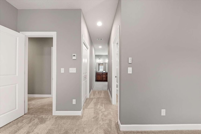 7708 N Warren Ln, Spokane, WA 99208 - corridor featuring carpet floors, baseboards, and recessed lighting