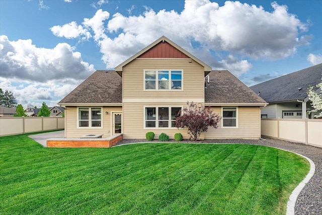 7708 N Warren Ln, Spokane, WA 99208 - back of house with roof with shingles and a patio