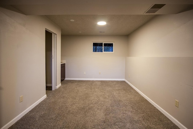 38821 N Newport Hwy, Elk, WA 99009 - spare room with dark carpet, recessed lighting, a textured ceiling, and baseboards