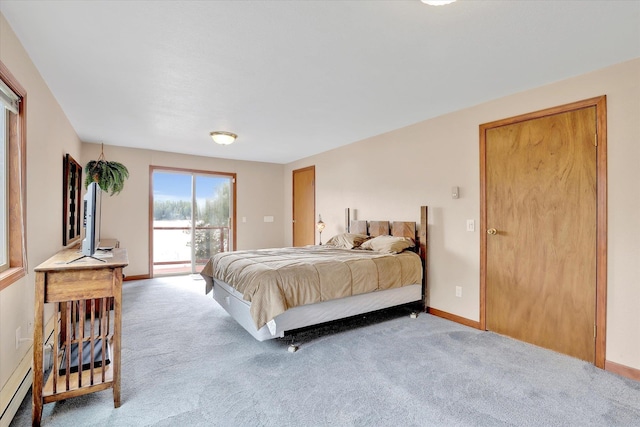 13227 N E Newman Lake Dr, Newman Lake, WA 99025 - carpeted bedroom featuring access to outside and baseboards