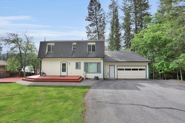 13227 N E Newman Lake Dr, Newman Lake, WA 99025 - view of front facade featuring asphalt driveway, a chimney, a shingled roof, and an attached garage