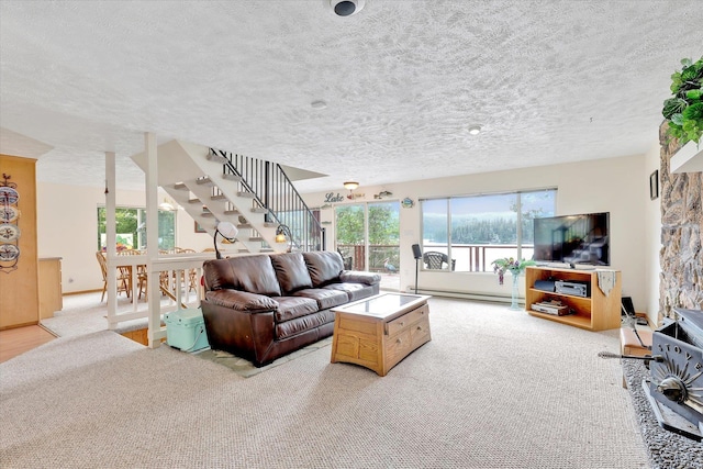 13227 N E Newman Lake Dr, Newman Lake, WA 99025 - living area with stairs, a textured ceiling, healthy amount of natural light, and light carpet