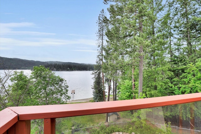 13227 N E Newman Lake Dr, Newman Lake, WA 99025 - water view with a heavily wooded area