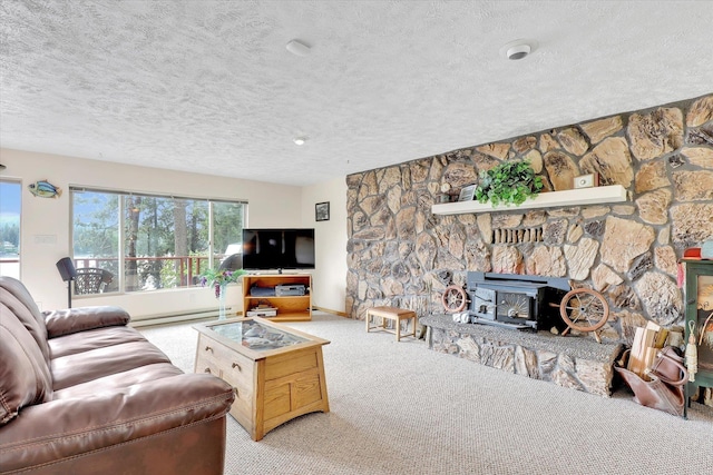 13227 N E Newman Lake Dr, Newman Lake, WA 99025 - carpeted living room with a textured ceiling, a wood stove, and baseboards