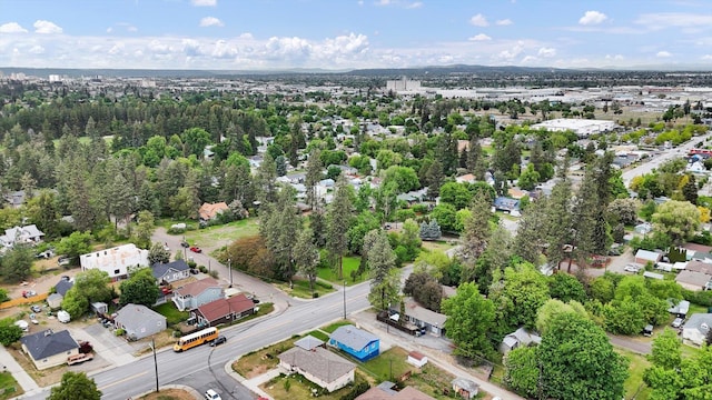 aerial overview of property's location featuring nearby suburban area