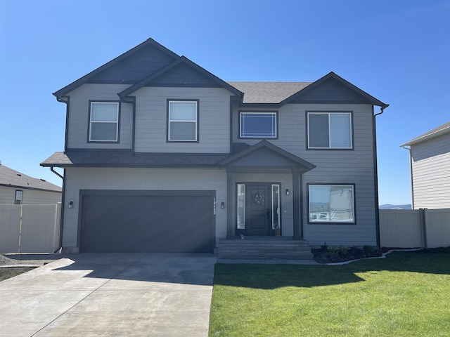 18718 E Riverside Ct, Spokane Valley, WA 99016 - view of front of property with a shingled roof, driveway, and an attached garage