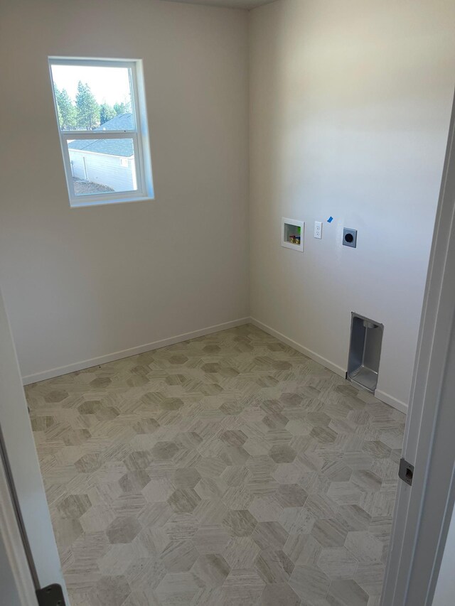 18718 E Riverside Ct, Spokane Valley, WA 99016 - laundry area featuring hookup for an electric dryer, washer hookup, and baseboards